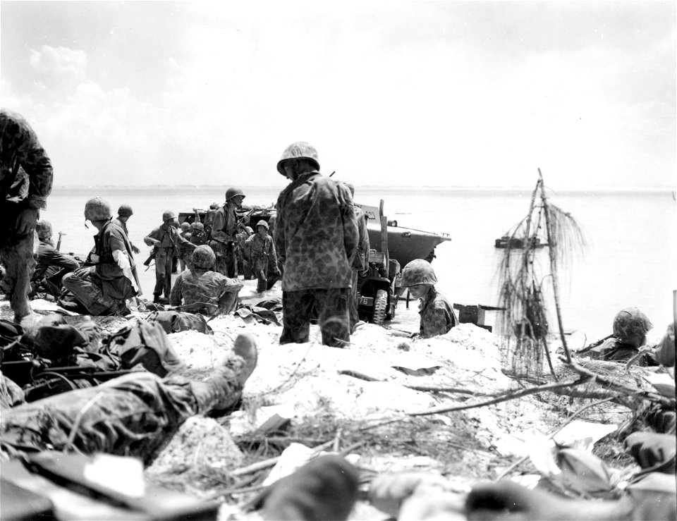 Marines at Red Beach 2. Saipan. 15 June, 1944.