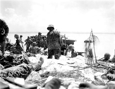Marines at Red Beach 2. Saipan. 15 June, 1944.