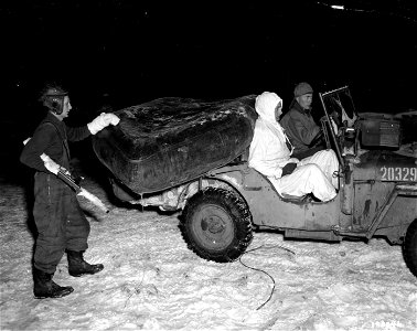 SC 198846 - Members of a Cavalry reconnaissance patrol, these three men prepare to cross the Saar River in a rubber boat.