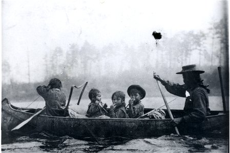 Native American family on Basswood River near Wheel Barrow Portage – from Indian village on Lac LaCroix, 1915