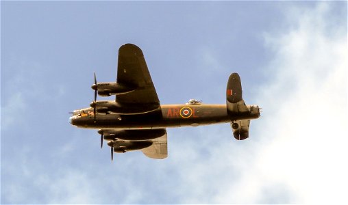 Avro Lancaster flying over Chevening Church. Biggin Hill Air Show.