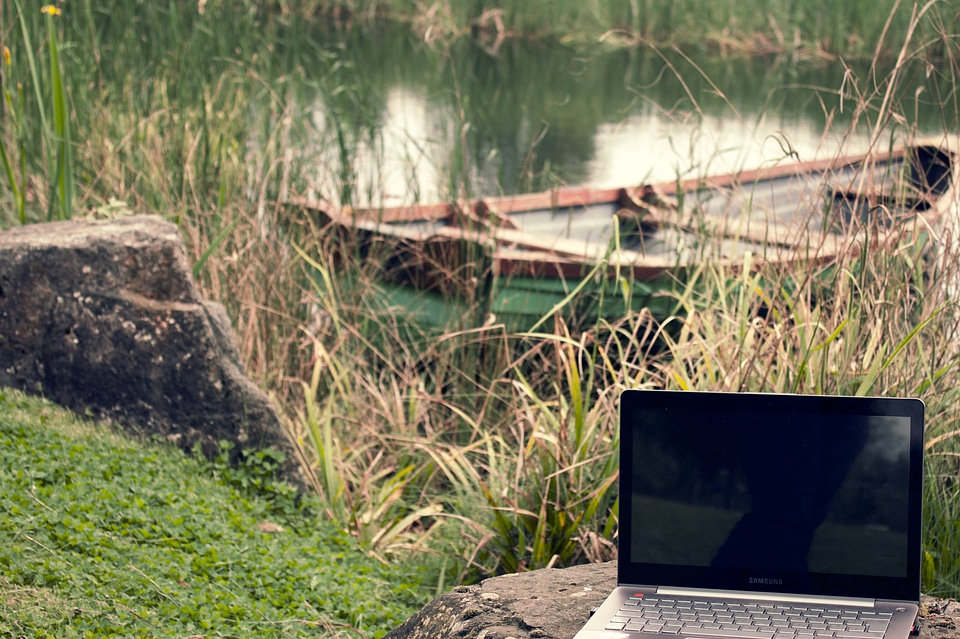 Laptop Computer Near Lake