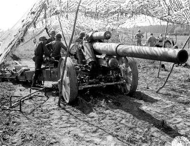 SC 329833 - Captured 150mm German gun used by "B" Co., 894th T.D. Bn. 14 September, 1944. photo