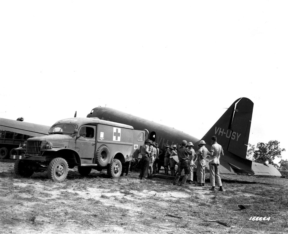 SC 166664 - Evacuation of wounded is sped up by the use of transport planes regularly flying between the advance clearing stations.
