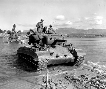 SC 348820 - Pershing M-1 tanks crossing the Kumho River on the way to the Naktong River in Korea. 18 September, 1950.