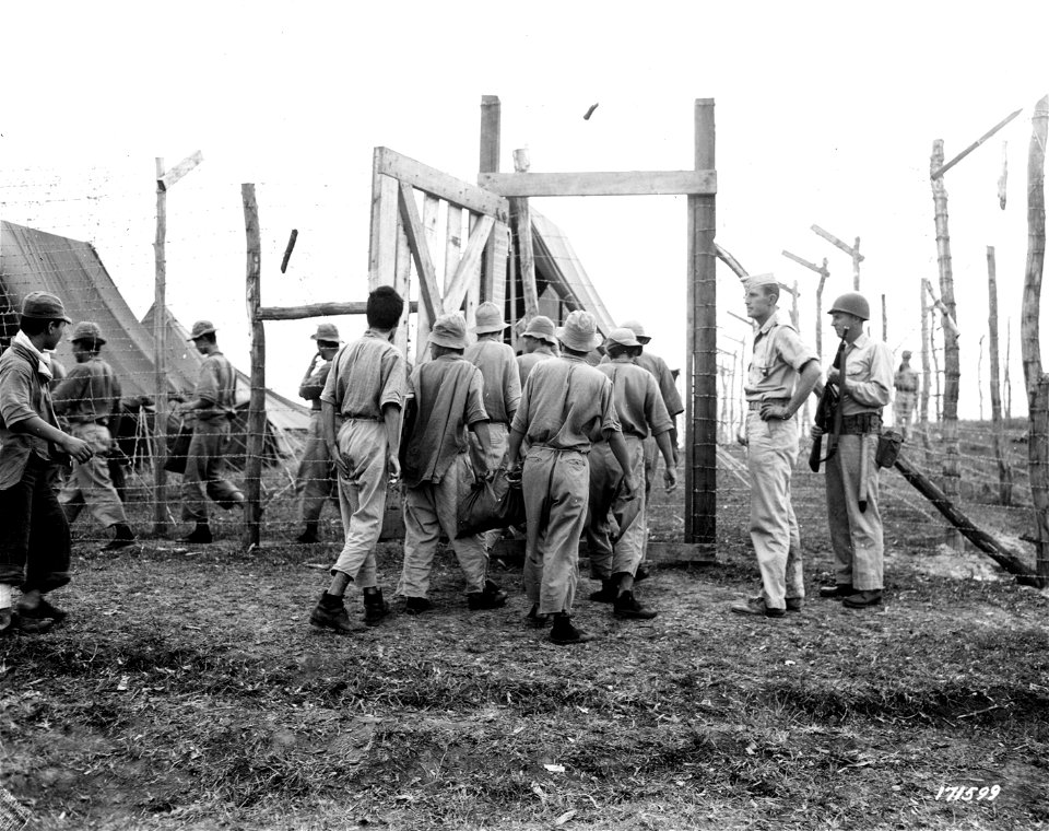 SC 171599 - Japanese prisoners new stockades built for them after having lived for a short time in temporary shelter.