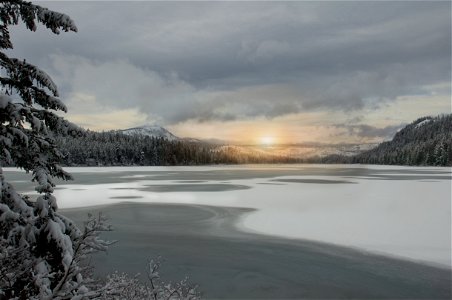 Sunset on a frozen lake, Oregon photo