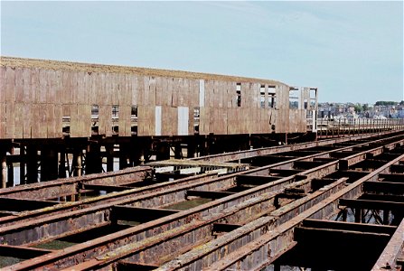 Remains of Ryde Pier tramway with the railway station behind photo