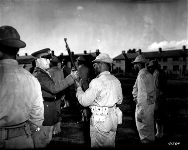 SC 151564 - Major General John C.H. Lee during an inspection tour of colored troops somewhere in England. photo