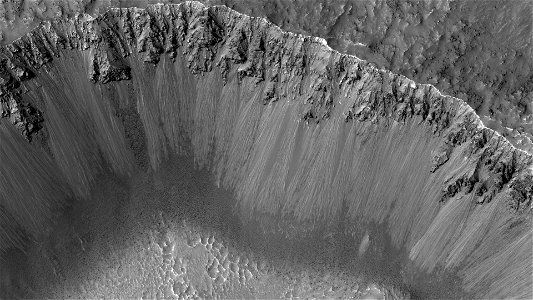 A Crater with Debris Aprons in Tyrrhena Terra photo