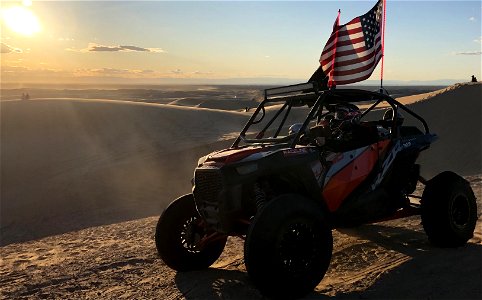OHV riders watching sunset