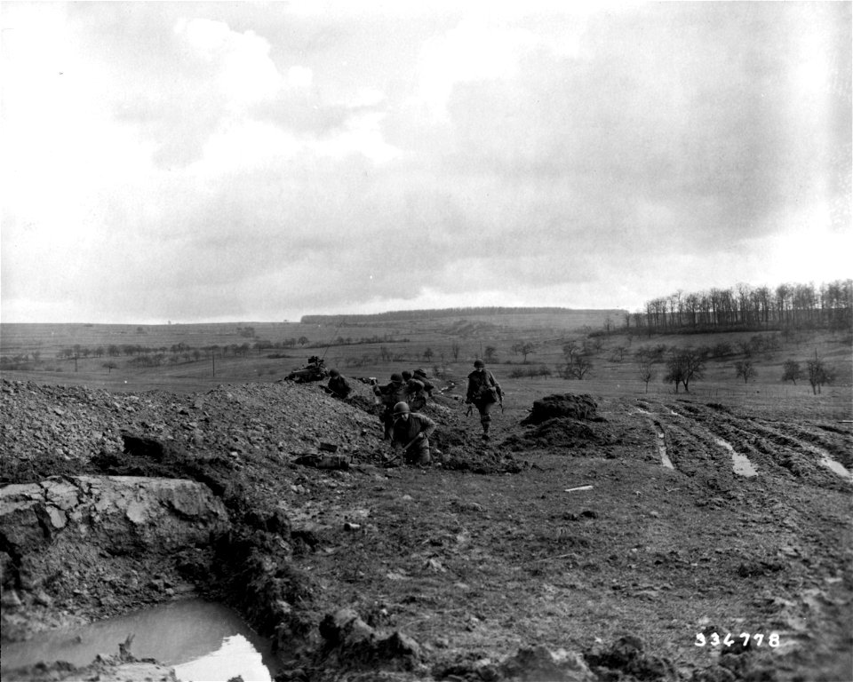 SC 336778 - The 94th Division troops dig in near Sinz, Germany, as a German attempt to attack the town is imminent.