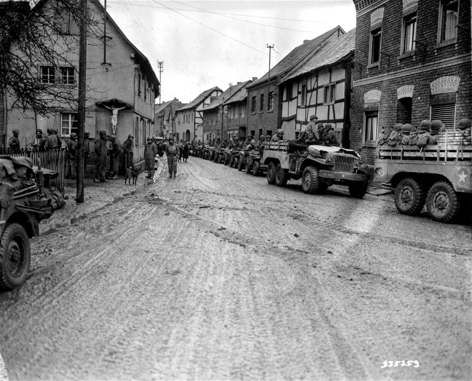 SC 335253 - Still another small German town falls to the infantrymen of the 9th Armored Division, U.S. First Army, as they drive through Kleinbullesheim, Germany, in the march to the Rhine River.