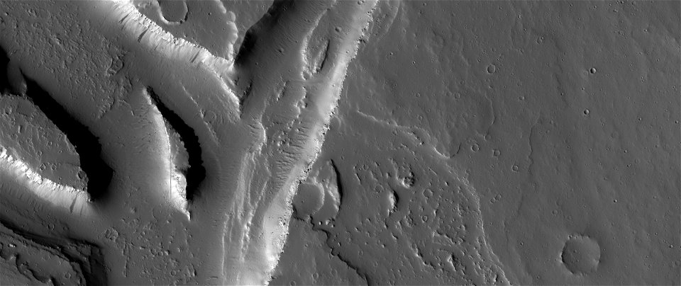 Channels and Lava Flows on the Tharsis Plateau
