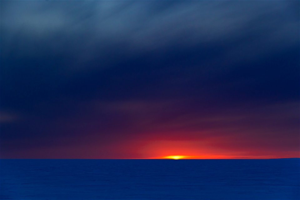 A winter sunset over the frozen Kotzebue Sound