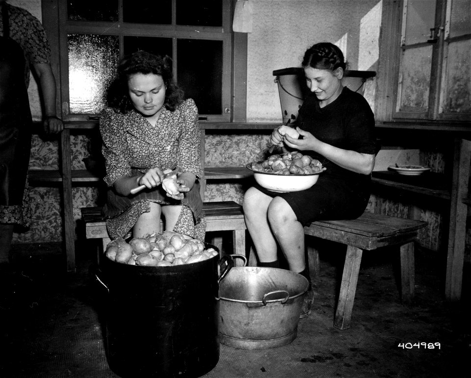 SC 404989 - Russians, freed of the Nazi yoke by the Allied capture of that nation, are ready to go back to Russia to help fight the Nazis.