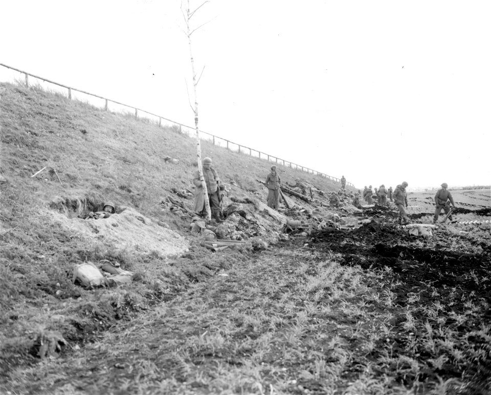 SC 270651 - Infantrymen dug in along bank of autobahn, holding the point important to the troops.