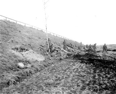 SC 270651 - Infantrymen dug in along bank of autobahn, holding the point important to the troops. photo