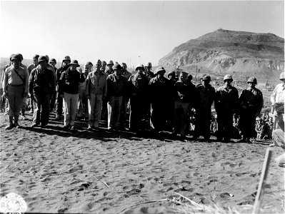 SC 335366 - Iwo Jima. Attending officers at a flag raising ceremony.