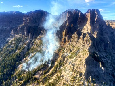 The Big Horn Fire, a remote wildfire located in steep, rocky terrain in the northwest corner of Yellowstone National Park. photo
