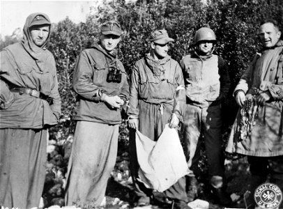 SC 421528 - At the request of the Germans who suffered heavy casualties on Mt. Castellone during an attack on the 36th Div., a truce was granted from 0815 to 1230 hours to enable the Germans to remove their dead. photo