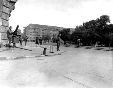SC 335346 - Members of a Belgian Security Guard, which has been operating with the VII Corps since 1944, on posts near VII Corps HQ in Leipzig, Germany. 8 June, 1945.