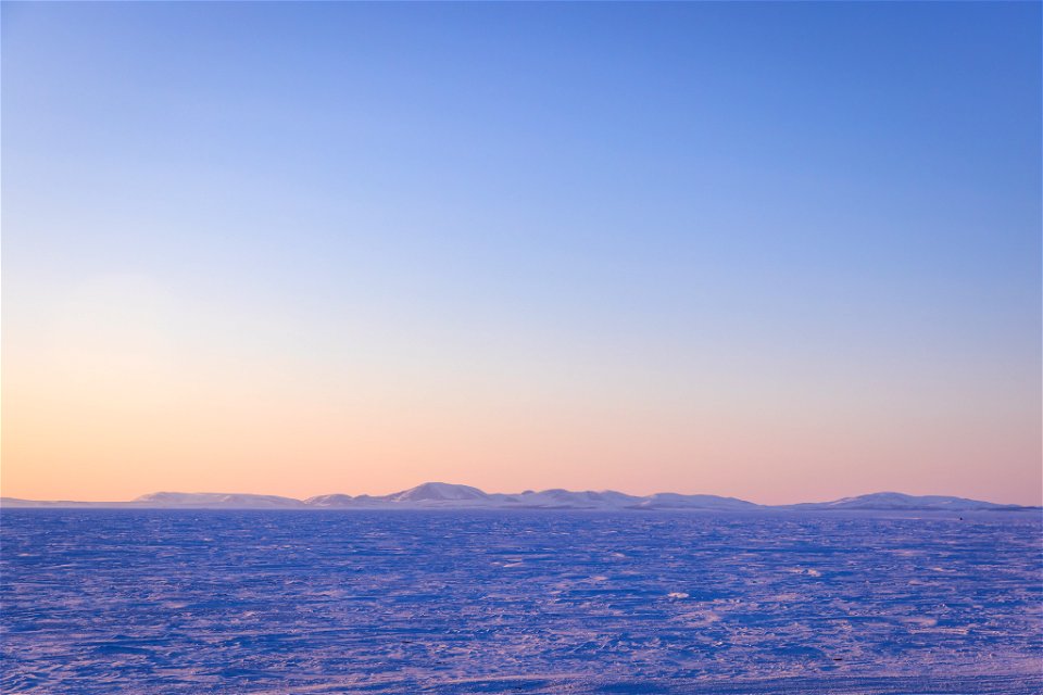 Sunset over frozen Kotzebue Sound