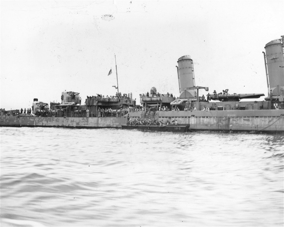 SC 364353 - 1st wave of 5th Cavalry Regiment, 1st Cavalry Division invasion forces load into landing craft from U.S. Destroyer U.S.S. Bush. Momote Bay, Manus Island, Admiralty Group.