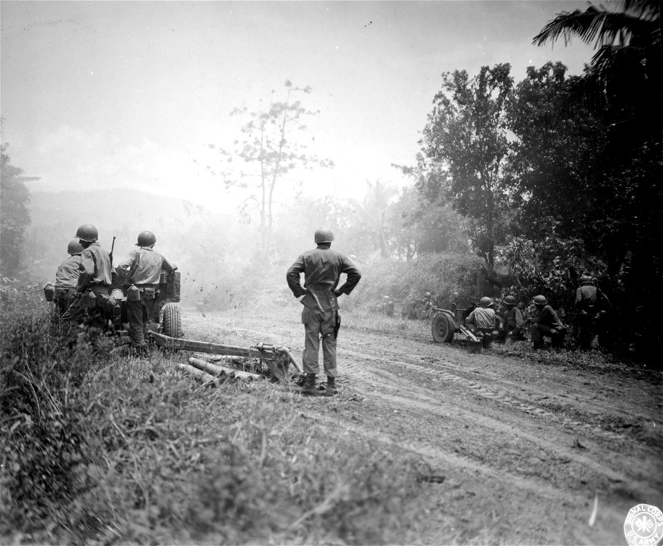 SC 364531 -  57mm and 75mm guns firing at Jap positions near [illegible], Luzon, P.I.