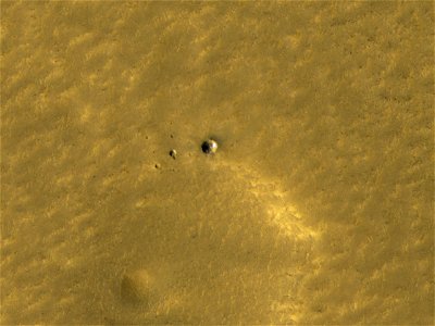 Long-lasting Ice in a Young Crater photo