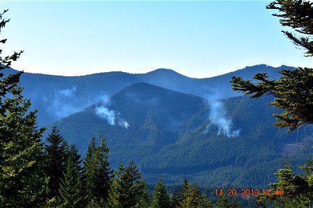 Pile burning smoke on the Mt. Hood National Forest in 2019 - seen in distance photo