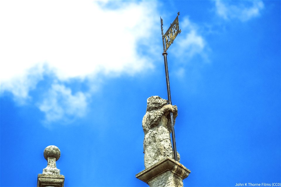 Maidstone Museum Bear? Dog? V.R Flag. Sculpture on museum roof.