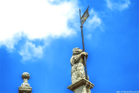 Maidstone Museum Bear? Dog? V.R Flag. Sculpture on museum roof.