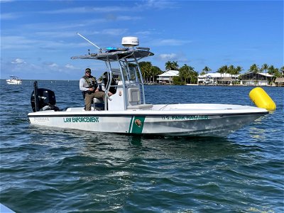 Law Enforcement Ranger with Boat