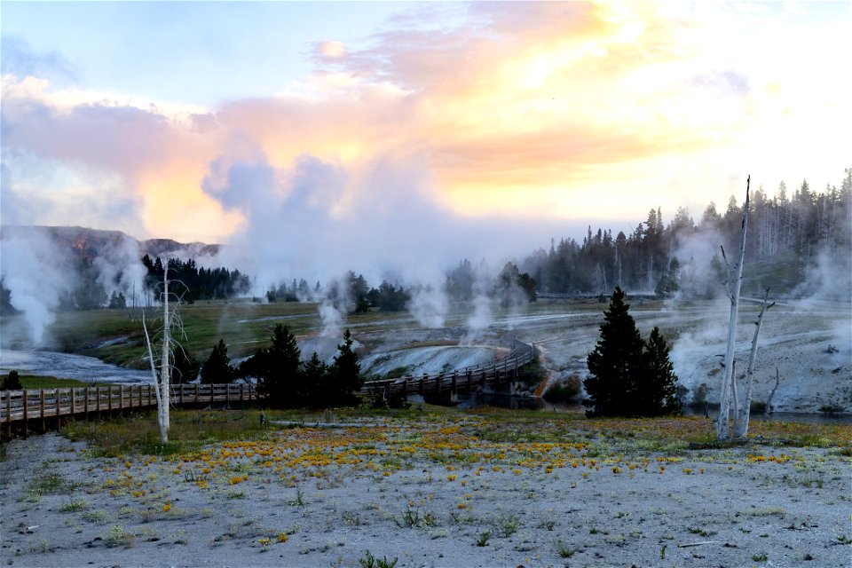 Sunrise over boardwalk to Grand Geyser