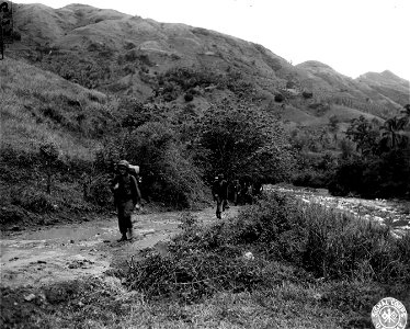 SC 374824 - Patrol from the 164th Inf. Regt. starting out to set up an OP in Jap-held territory. Cebu island, P.I. 9 April, 1945. photo