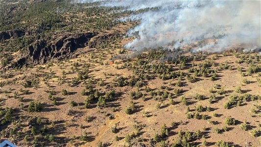 A Helitorch on Graves Creek Prescribed Burn photo