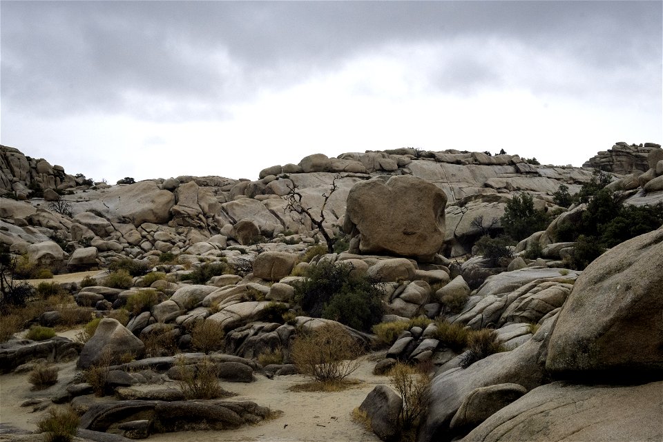 Wet rocks and clouds over Barker Dam