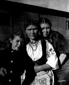 SC 404991 - A Russian mother, Mrs. Nadiegdo, and her two daughters, among refugees in Luxembourg waiting to be returned to their native land.