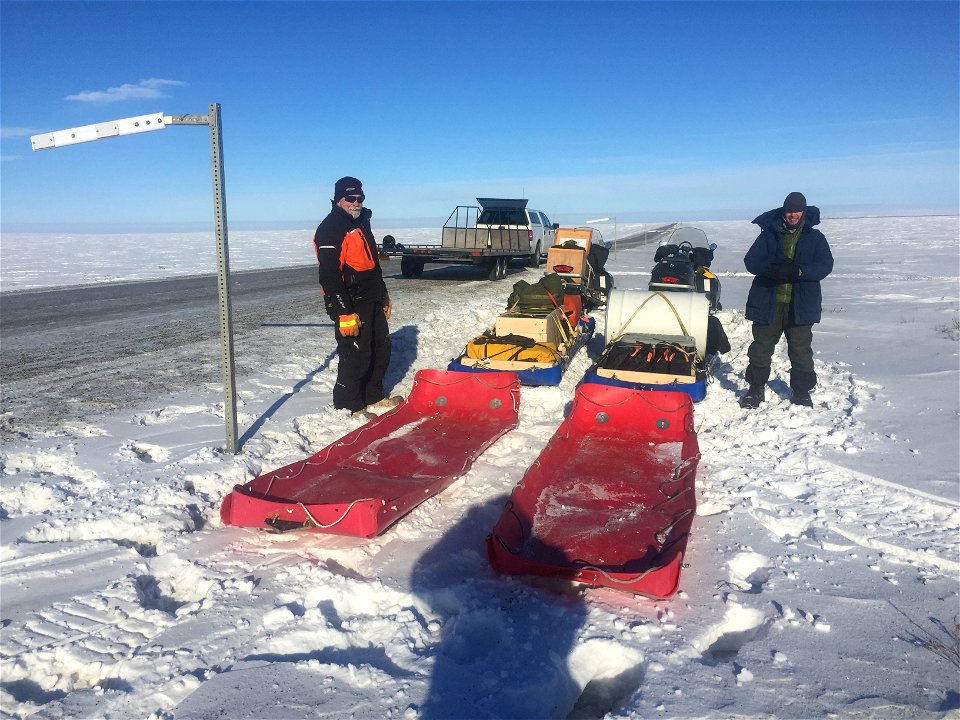 R7ArcticNWR Volunteer Brad delivering snow machine and sleds to Kaktovik