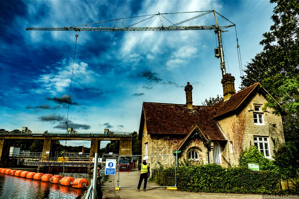 River Medway Allington Lock. Sluice Gate Works. Crane above. Divers in the river.