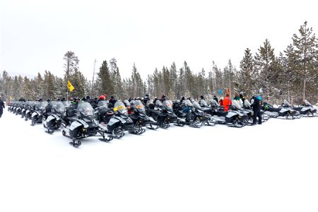 Snowmobile groups stopping at madison warming Hut (2) photo