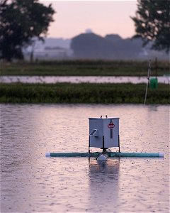 Automatic Fish Feeder on Pond