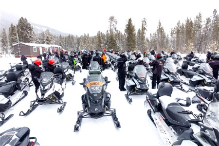 Snowmobile groups stopping at madison warming Hut (3) photo