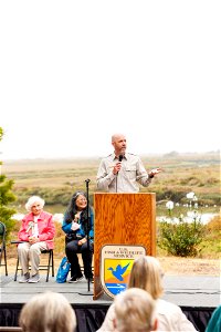 Complex manager speaks during opening ceremony photo