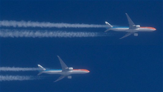 A huge KLM Boeing in the "Orange Pride" Livery (too bad they're out of the World Cup already):
