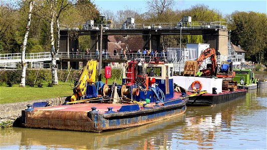 Allington Lock. Walking group walking over sluice.