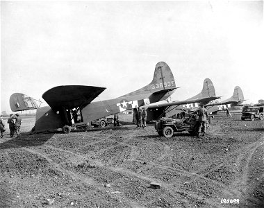 SC 195699 - Lined up with hatches open to receive their cargo, these gliders are part of the 82nd Airborne Div, which invaded Holland from Cottesmore AIrdrome, England. 17 September, 1944. photo