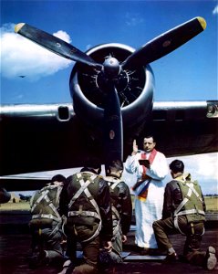 C-1105 - Drum-head service led by Capt. M. S. Ragan, Catholic Padre, at a pioneer flying fortress base in England, prior to the Crew's setting out on a daylight attack on Nazi-dominated Europe. photo