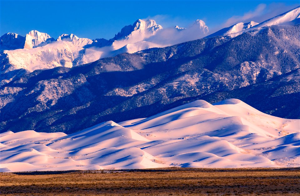 Snowy Star Dune and Crestone Peaks